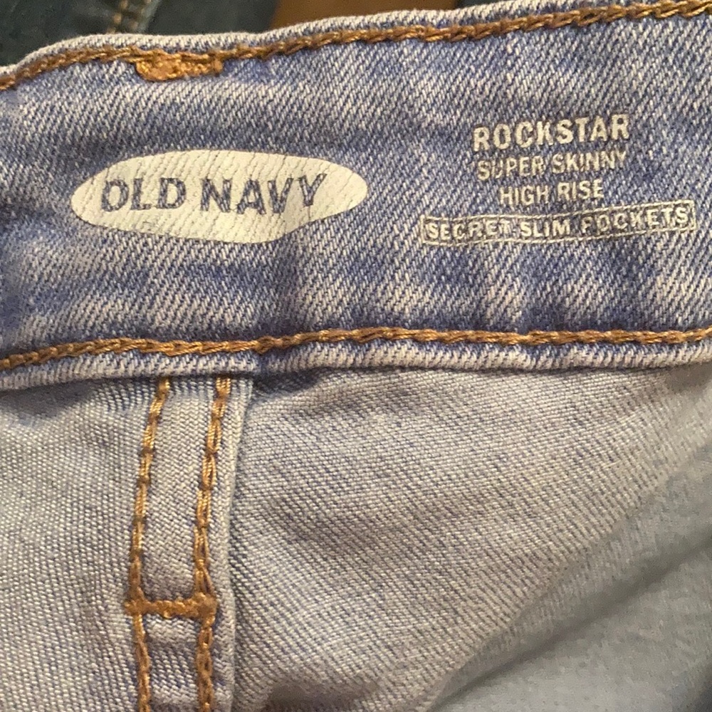 Old navy blue ripped jeans